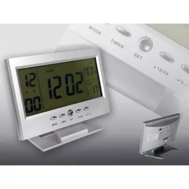 LCD часовник със звуково активиране светлината на дисплея.